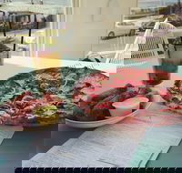 The Kitchen and Patio - Accommodation Tasmania